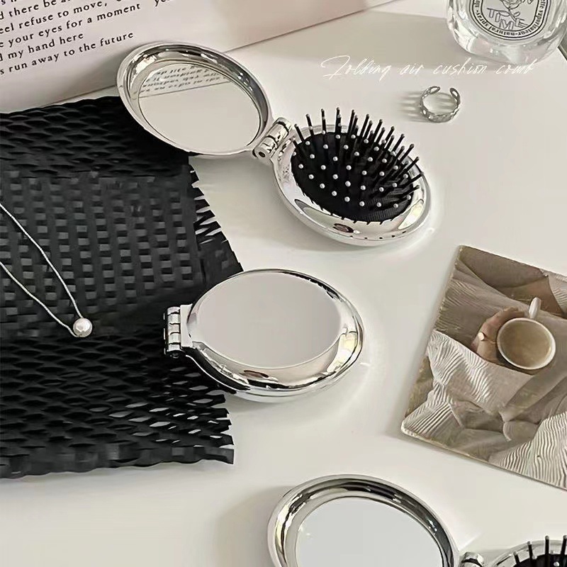 O1CN01VrKm381gO35v48hEM_2216517404131-0-cib.jpg Portable folding mirror all-in-one comb